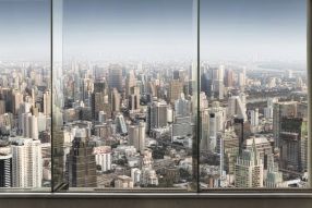 Фотообои Панорама города в окне